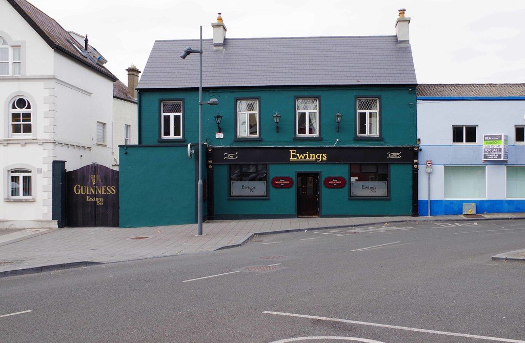Ewing's on the Haymarket, painted dark teal with gold lettering
